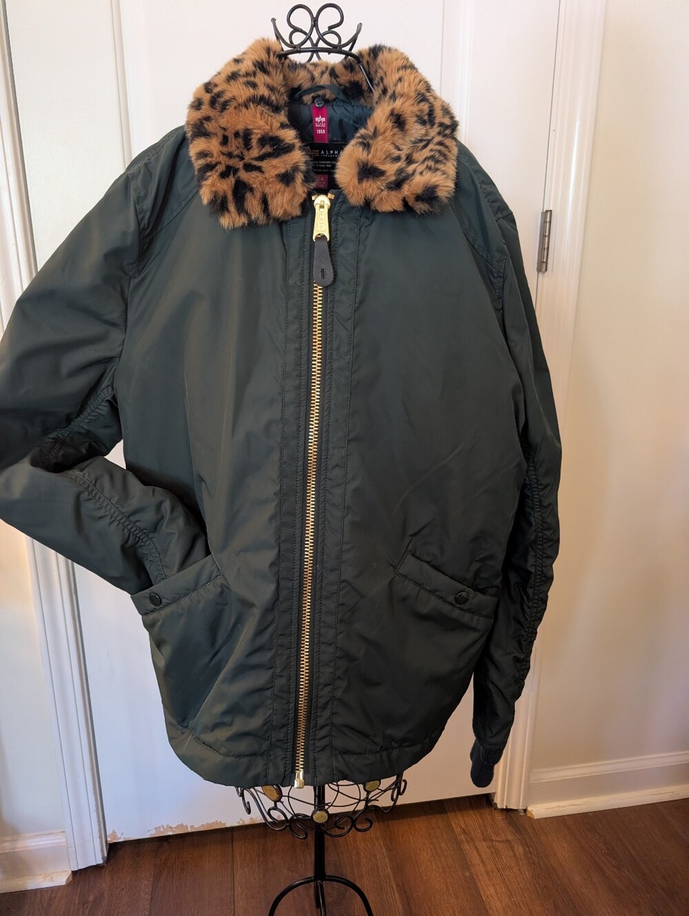 UO: Alpha Industries Dark Green Bomber with faux leopard collar